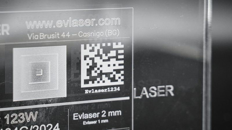 Laser Marking On Transparent Plexiglass With High Definition DataMatrix Code And Technical Text Engraved On PMMA